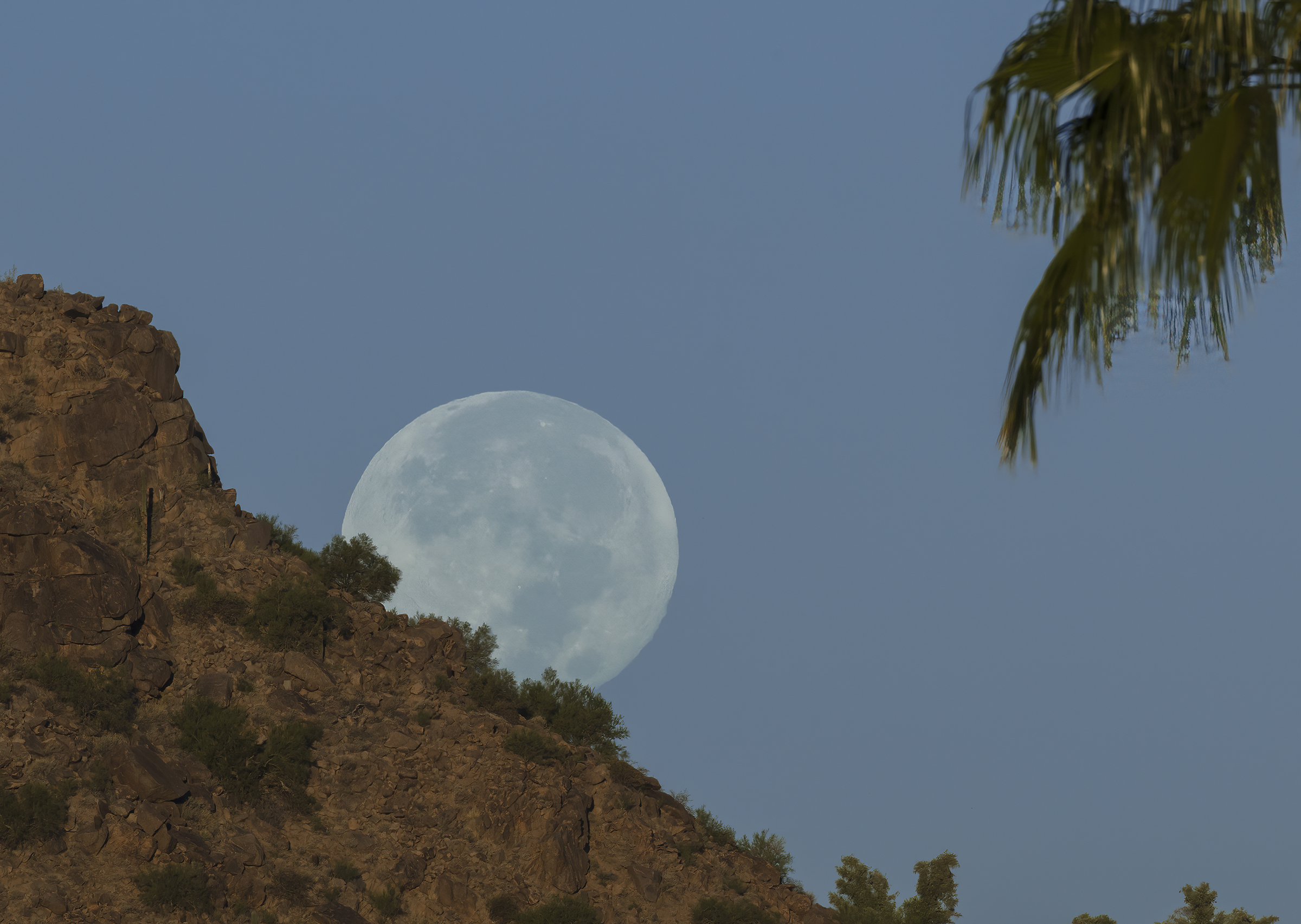 Moon setting over Camelback Mountain